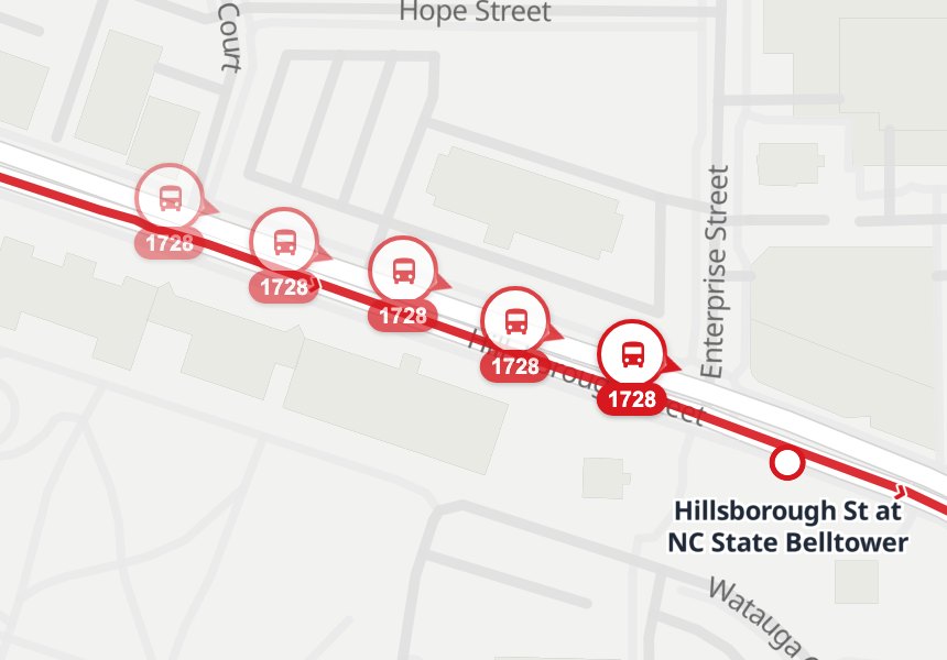 A street map of Hillsborough Street near the Belltower with Route 30's line drawn on it. Five positions of one bus, reported a few seconds apart, sit a few metres either side of the line, the older ones faded.